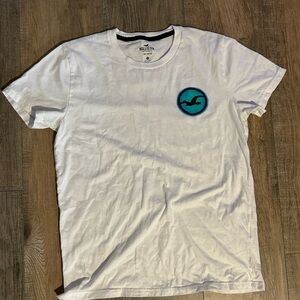 Hollister White Tee with Teal Emblem